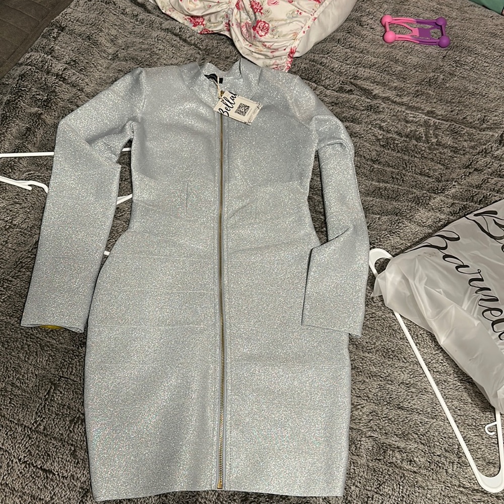 Size- medium. Dress is stretchable